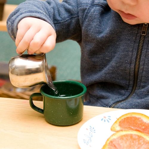 Pouring-Water a toddler pouring water